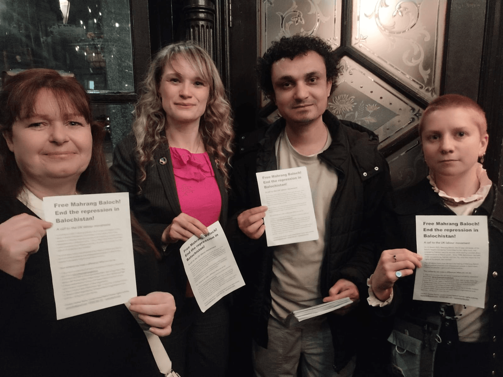 Aomar Karim discussing human rights violations in Balochistan with Tanya Vyhovsky, Bev Laidlaw, and Mariia Pastukh at the UK Parliament event on Ukraine solidarity.