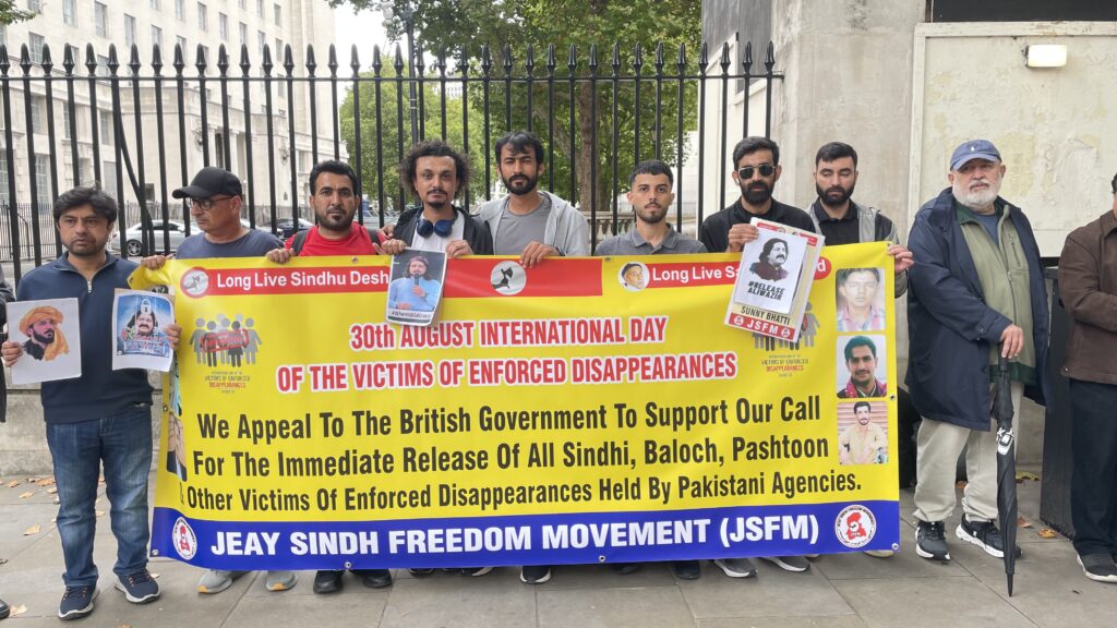 Aomar Karim, Baloch political and human rights activist, speaking at a protest outside 10 Downing Street on 30 August 2025, during the International Day of the Victims of Enforced Disappearances.