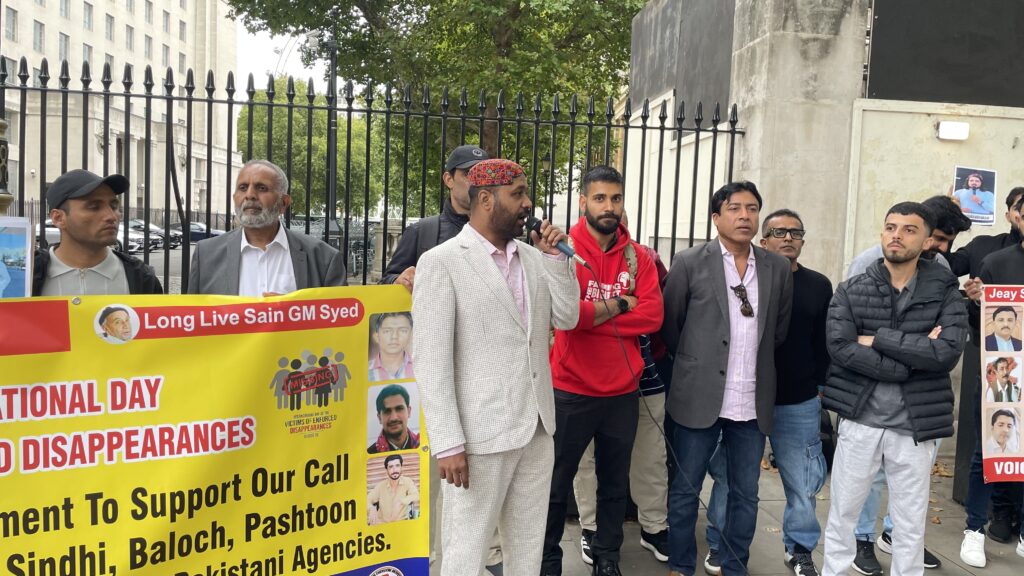 Baloch activist Aomar Karim participates in a peaceful demonstration outside 10 Downing Street on 30 August 2025, marking the International Day of the Victims of Enforced Disappearances, advocating for justice and raising awareness about enforced disappearances.