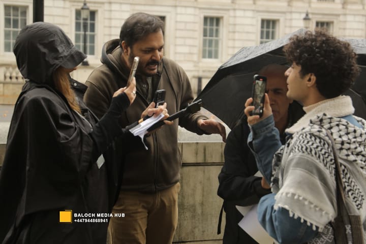 This person try to disturbe Protest - Disruption Attempt at Baloch Protest by Alleged Pro-Pakistan Agents – London, 19 Oct 2025 | Aomar Karim | aomarkarim.com