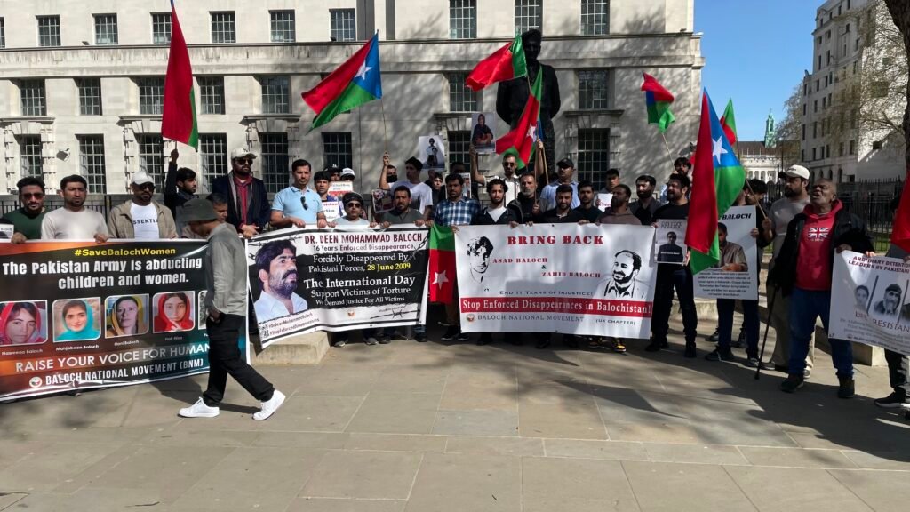 Baloch activists outside 10 Downing Street, London, during the Baloch National Movement UK Chapter protest on 8 April 2026.