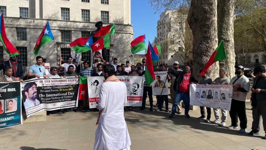 Baloch activists outside 10 Downing Street, London, during the Baloch National Movement UK Chapter protest on 8 April 2026.