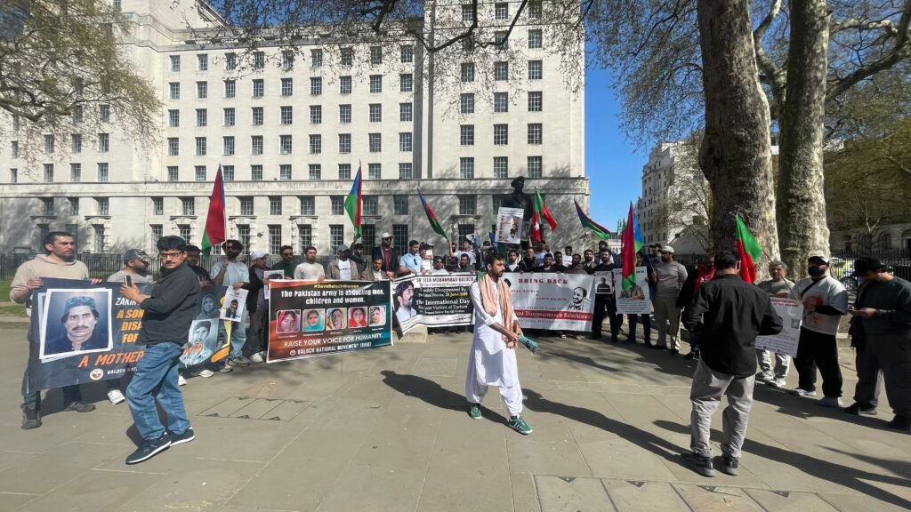 Baloch activists outside 10 Downing Street, London, during the Baloch National Movement UK Chapter protest on 8 April 2026.